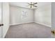 Cozy bedroom featuring neutral carpet and a ceiling fan at 172 Hawthorn Dr., Pawleys Island, SC 29585