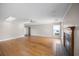 Large living room featuring hardwood floors, a fireplace, and recessed lighting for a modern touch at 172 Hawthorn Dr., Pawleys Island, SC 29585