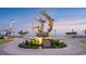 Striking mermaid and dolphin sculpture along the boardwalk, set against a beautiful coastal backdrop at sunset at 1833 Hardwood Ct., Conway, SC 29526