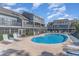 Community pool with lounge chairs and well maintained grounds at 1881 Colony Dr. # 8-S, Surfside Beach, SC 29575