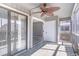 Cozy screened porch with sliding glass doors, and tile flooring at 1881 Colony Dr. # 8-S, Surfside Beach, SC 29575