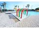 Splash pad near the pool provides a shallow, fun play area with colorful arches and a mushroom water fountain at 205 74Th Ave. N # 702, Myrtle Beach, SC 29572