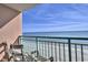 Balcony with seating overlooking the sandy beach and ocean views at 2207 Ocean Blvd. S # 1217, Myrtle Beach, SC 29577