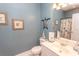 Charming bathroom with coastal decor, including starfish and a turtle wall hanging at 2241 Waterview Dr. # 224, North Myrtle Beach, SC 29582