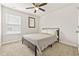 Simple bedroom with a full bed, neutral decor, and plush carpeting at 2321 Copper Creek Loop, Longs, SC 29568