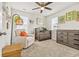 Cozy Bedroom room with a crib, dresser, reading chair, and plush carpeting at 2321 Copper Creek Loop, Longs, SC 29568