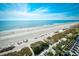 Expansive beach view highlighting the sandy shores, palm trees, and calm ocean waters at 2401 S Ocean Blvd. # 854, Myrtle Beach, SC 29577