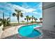 Beautiful outdoor pool with clear blue water, surrounded by lush palm trees and offering ocean views at 2401 S Ocean Blvd. # 854, Myrtle Beach, SC 29577