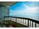 Balcony view of beach and ocean with seating on a sunny day at 2401 S Ocean Blvd. # 859, Myrtle Beach, SC 29577