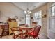 Cozy breakfast nook with a chandelier and multiple windows for natural light at 305 Aqua Vista Ct., Myrtle Beach, SC 29588