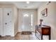 Inviting foyer featuring neutral walls, tiled floor, and console table at 305 Aqua Vista Ct., Myrtle Beach, SC 29588