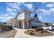 Inviting clubhouse featuring classic architecture, well-maintained landscaping, and a welcoming entrance at 3074 Viceroy Loop, Little River, SC 29566