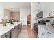 Spacious kitchen featuring an island, granite countertops, and stainless steel appliances at 3074 Viceroy Loop, Little River, SC 29566