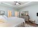 Bright and airy main bedroom with hardwood floors and a ceiling fan at 3074 Viceroy Loop, Little River, SC 29566