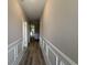 Hallway featuring elegant trim work and wood flooring at 3121 Tiger Tail Rd., Conway, SC 29526