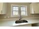 Bright kitchen with stainless steel sink with window overlooking the yard at 3121 Tiger Tail Rd., Conway, SC 29526