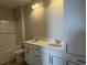 Elegant bathroom with double vanity, white cabinetry, and a tub-shower combination at 3135 Tiger Tail Rd., Conway, SC 29526