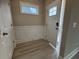 Welcoming foyer with a storage closet and light wood flooring, leading to the main entrance at 3135 Tiger Tail Rd., Conway, SC 29526