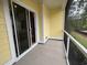 Relaxing screened porch with sliding glass doors, perfect for enjoying the outdoors in comfort at 3135 Tiger Tail Rd., Conway, SC 29526