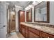 Bathroom features double sink vanity, walk-in shower and tile floors at 316 Shuffleboard Ct., Myrtle Beach, SC 29572