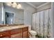 Bathroom features a single vanity with granite counter and shower-tub combination at 316 Shuffleboard Ct., Myrtle Beach, SC 29572