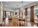 Spacious dining room with hardwood floors, chandeliers, and plenty of natural light at 316 Shuffleboard Ct., Myrtle Beach, SC 29572