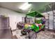 Golf cart parked in a clean and organized garage space at 316 Shuffleboard Ct., Myrtle Beach, SC 29572