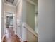 Hallway with wainscoting and hardwood floors at 316 Shuffleboard Ct., Myrtle Beach, SC 29572