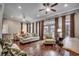 Bright living room with hardwood floors, comfortable seating, and ample natural light at 316 Shuffleboard Ct., Myrtle Beach, SC 29572