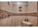 Beautiful tiled shower with built in shelves and bench seating at 316 Shuffleboard Ct., Myrtle Beach, SC 29572