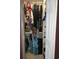 A walk-in closet with clothes hung up and folded on the shelving at 330 Fairwood Terrace, Myrtle Beach, SC 29588