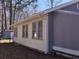 Side view of the house, highlighting the siding, windows, and exterior architecture at 330 Fairwood Terrace, Myrtle Beach, SC 29588