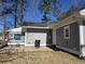 Rear view of the house, showing the back exterior, siding, and backyard area at 330 Fairwood Terrace, Myrtle Beach, SC 29588