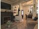 Cozy living room featuring a decorative fireplace, open floorplan and modern finishes at 330 Fairwood Terrace, Myrtle Beach, SC 29588