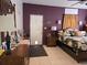 Main bedroom with a decorative bed, ceiling fan, dresser, and a view of a door at 330 Fairwood Terrace, Myrtle Beach, SC 29588