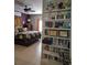 This main bedroom is decorated with a floral pattern on the bedspread and white shelves at 330 Fairwood Terrace, Myrtle Beach, SC 29588