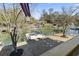 View of the backyard featuring a private dock and waterfront access, perfect for enjoying water activities at 3615 Sunfish St., Murrells Inlet, SC 29576