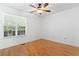 Bright bedroom features a ceiling fan and a window at 3615 Sunfish St., Murrells Inlet, SC 29576