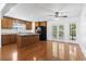 Well-lit kitchen featuring ample cabinets, an island, modern appliances, and an adjacent dining area at 3615 Sunfish St., Murrells Inlet, SC 29576