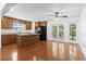 Well-lit kitchen features a center island, ample cabinetry, and modern black appliances, perfect for cooking and dining at 3615 Sunfish St., Murrells Inlet, SC 29576