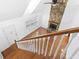 Bright living room with wood floors, stone fireplace, a ceiling fan, and natural light from many windows at 3615 Sunfish St., Murrells Inlet, SC 29576