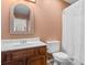 Lovely bathroom featuring a sink, a mirror, and a shower at 3816 James Pl., Little River, SC 29566