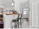 Bright dining area with a view into the living room at 4048 Sandtrap Ave., Little River, SC 29566