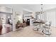 Eat-in kitchen featuring tile floors and a view into the living room beyond at 4048 Sandtrap Ave., Little River, SC 29566