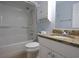 Bathroom featuring granite countertops, a bathtub, and a shower with a tiled surround at 4339 Dew N. Ct., Myrtle Beach, SC 29579