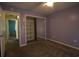 Bedroom with carpeted floors, sliding closet door, and a open doorway to another room at 4339 Dew N. Ct., Myrtle Beach, SC 29579