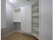 Spacious walk-in closet featuring built-in shelving and ample storage space at 4339 Dew N. Ct., Myrtle Beach, SC 29579