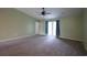 Spacious main bedroom includes a ceiling fan and access to the yard through French doors at 4339 Dew N. Ct., Myrtle Beach, SC 29579