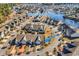 Aerial shot of move-in ready homes in a lovely neighborhood near a scenic pond at 5027 Prato Loop, Myrtle Beach, SC 29579