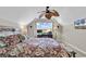 Bright bedroom featuring a ceiling fan, work space, and flat screen television at 5027 Prato Loop, Myrtle Beach, SC 29579